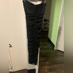 Black Tube dress. Can be dressed up or down.